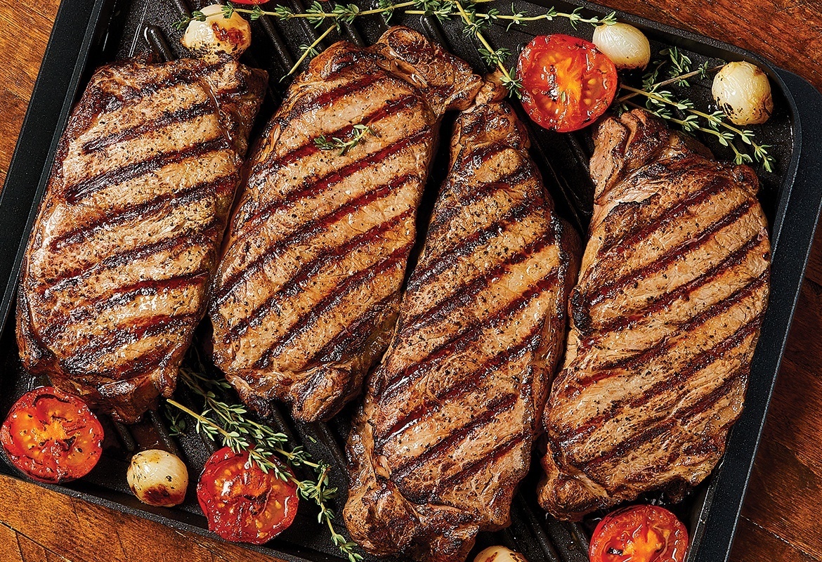 grilled steaks with grill marks on nonstick grill pan